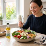 Mediterranean diet UK plate with vegetables, olive oil, and grilled fish