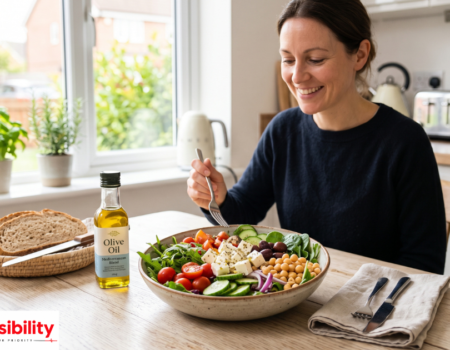 Mediterranean diet UK plate with vegetables, olive oil, and grilled fish